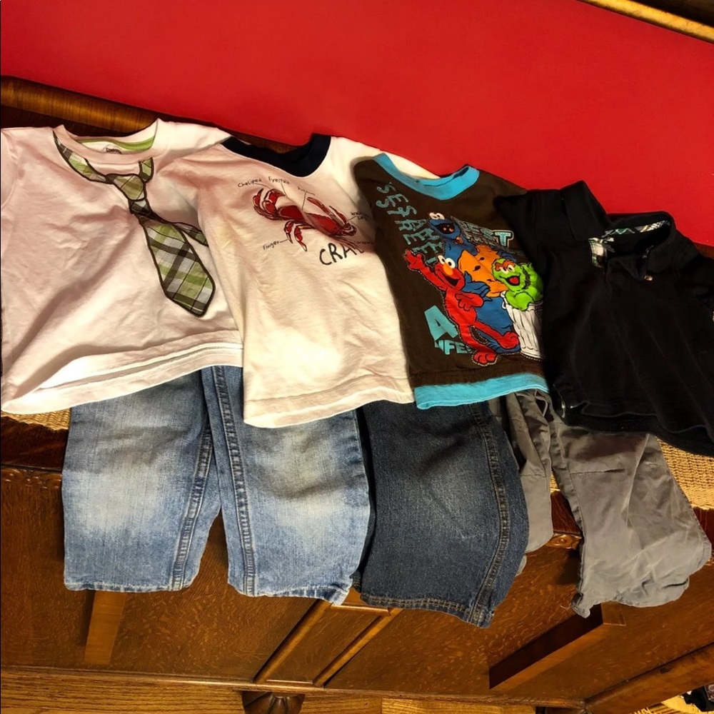 Three 2T boys pants, four 2T boys shirts.